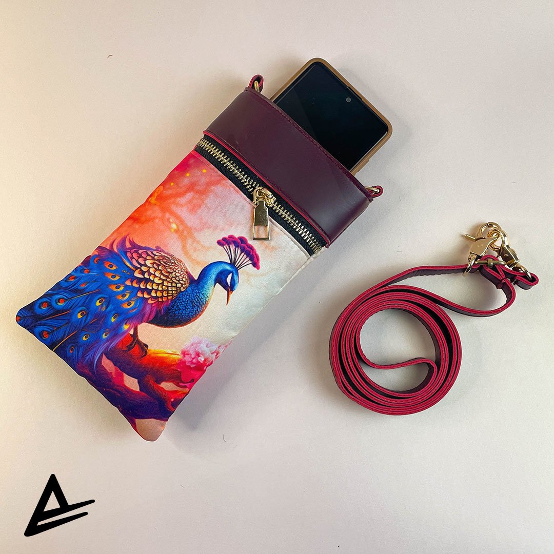 Feathered Fantasy mobile pouch with royal peacock and pink-orange fantasy background – Artrustick